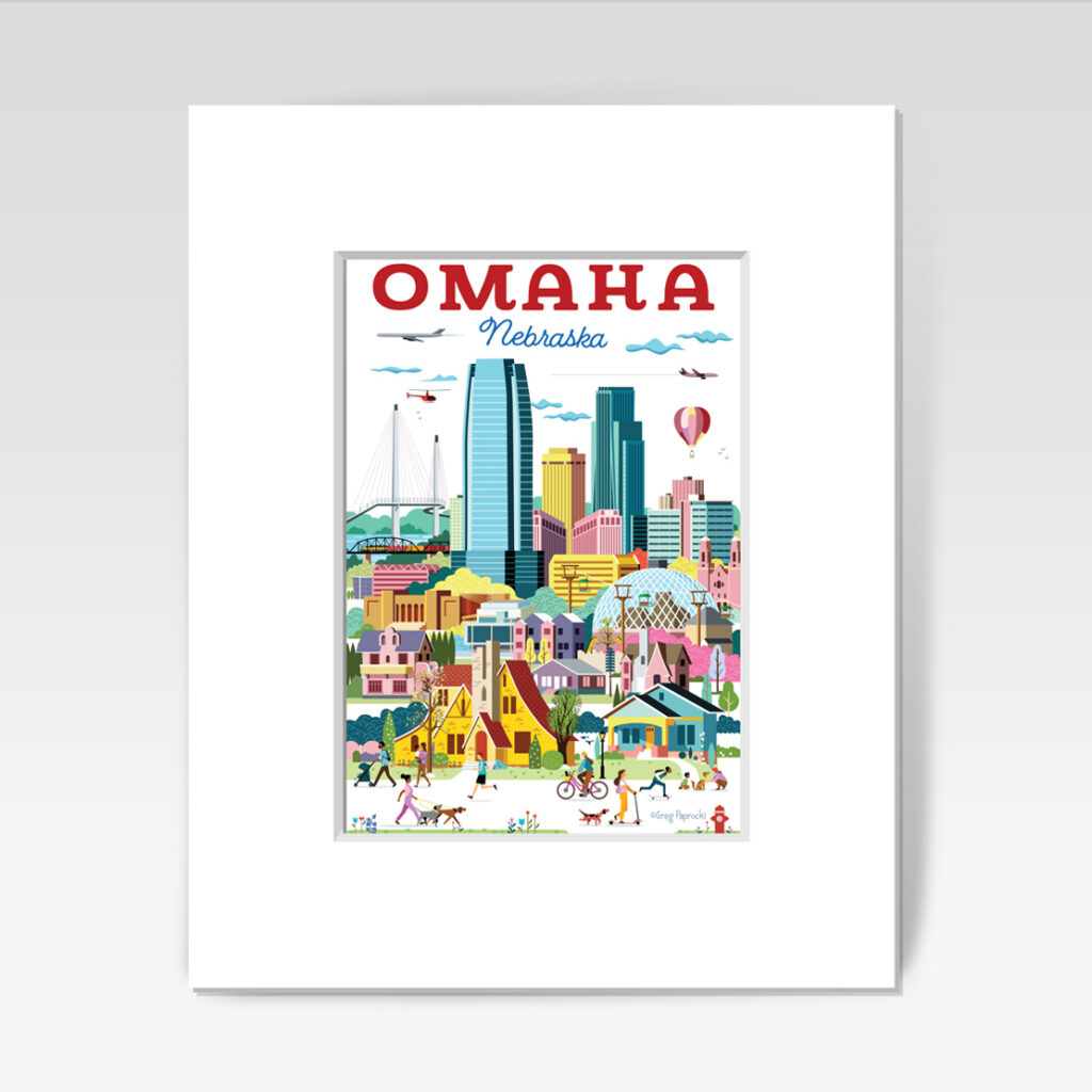 A colorful illustrated print of Omaha, Nebraska, featuring city buildings, bridges, hot air balloon, and people walking, biking, and relaxing in a vibrant, lively urban scene. The image is framed with a white mat.